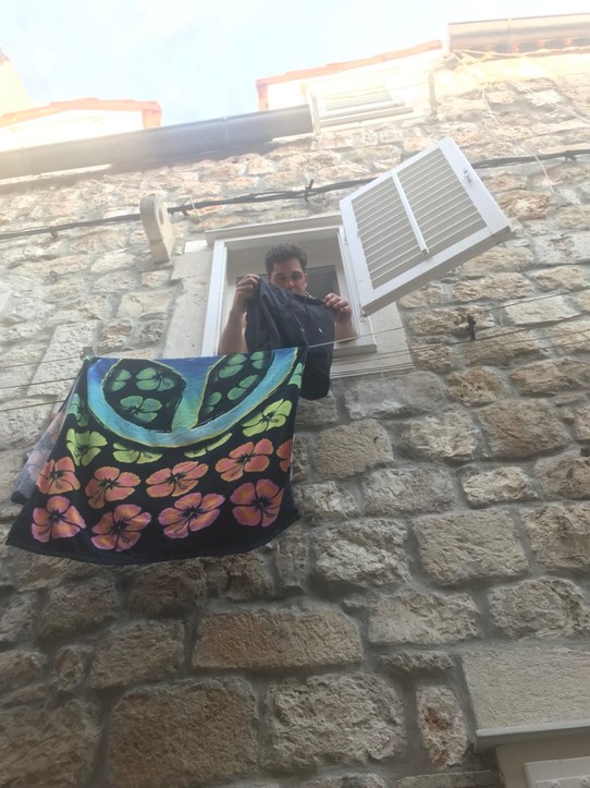 Croatia - Koločep - Matt doing the washing from our window