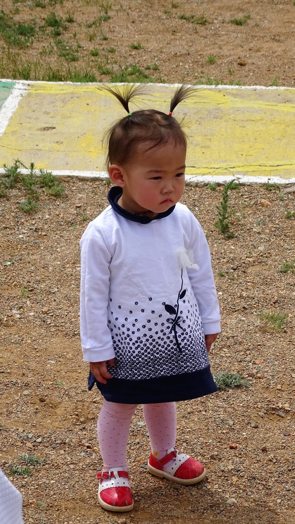 Mongolia - Mandalgovi - This little one wasn't so excited by the opening ceremony