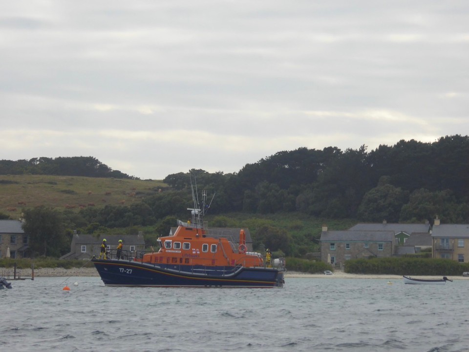 United Kingdom - Isles of Scilly - The lifeboat, which had been at anchor, set off for Hugh Town this evening.