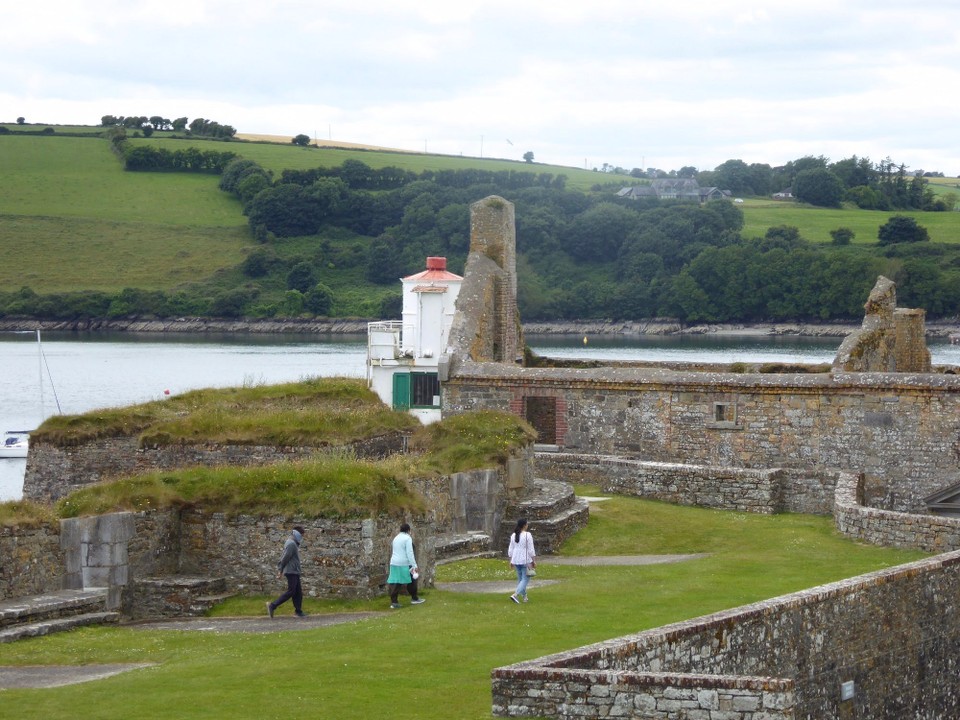 Ireland - Kinsale - The White Lady. Legend has it that Wilful, the daughter of the governor, was walking on the battlements with her newly wed husband, Sir Trevor, when she admired some flowers on the rocks below. Whilst the guard was sent to pick the flowers Sir Trevor agreed to keep sentry. He fell asleep, however.