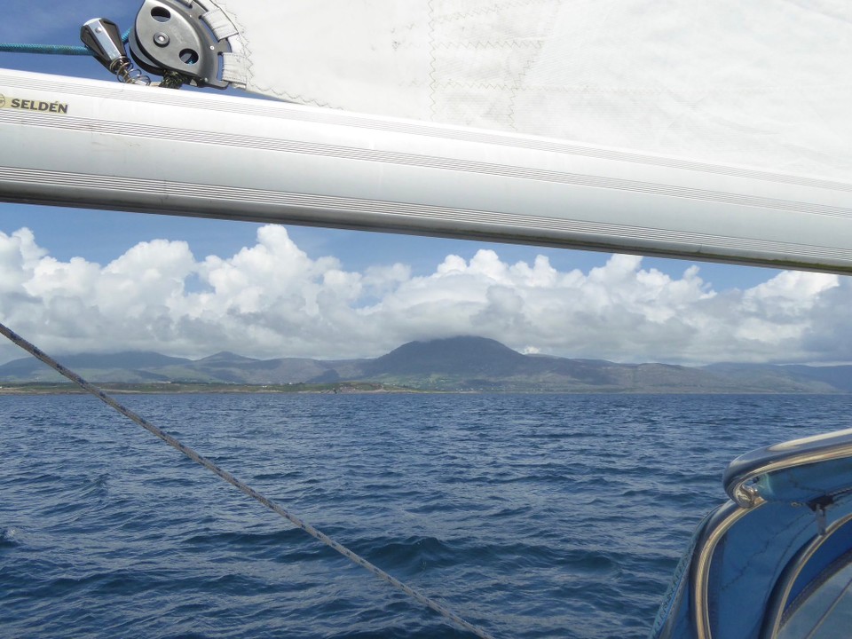 Ireland - Adrigole - A very little wind, so Kevin set up a preventer to stop the boom swinging over, and to catch whatever breeze there was.