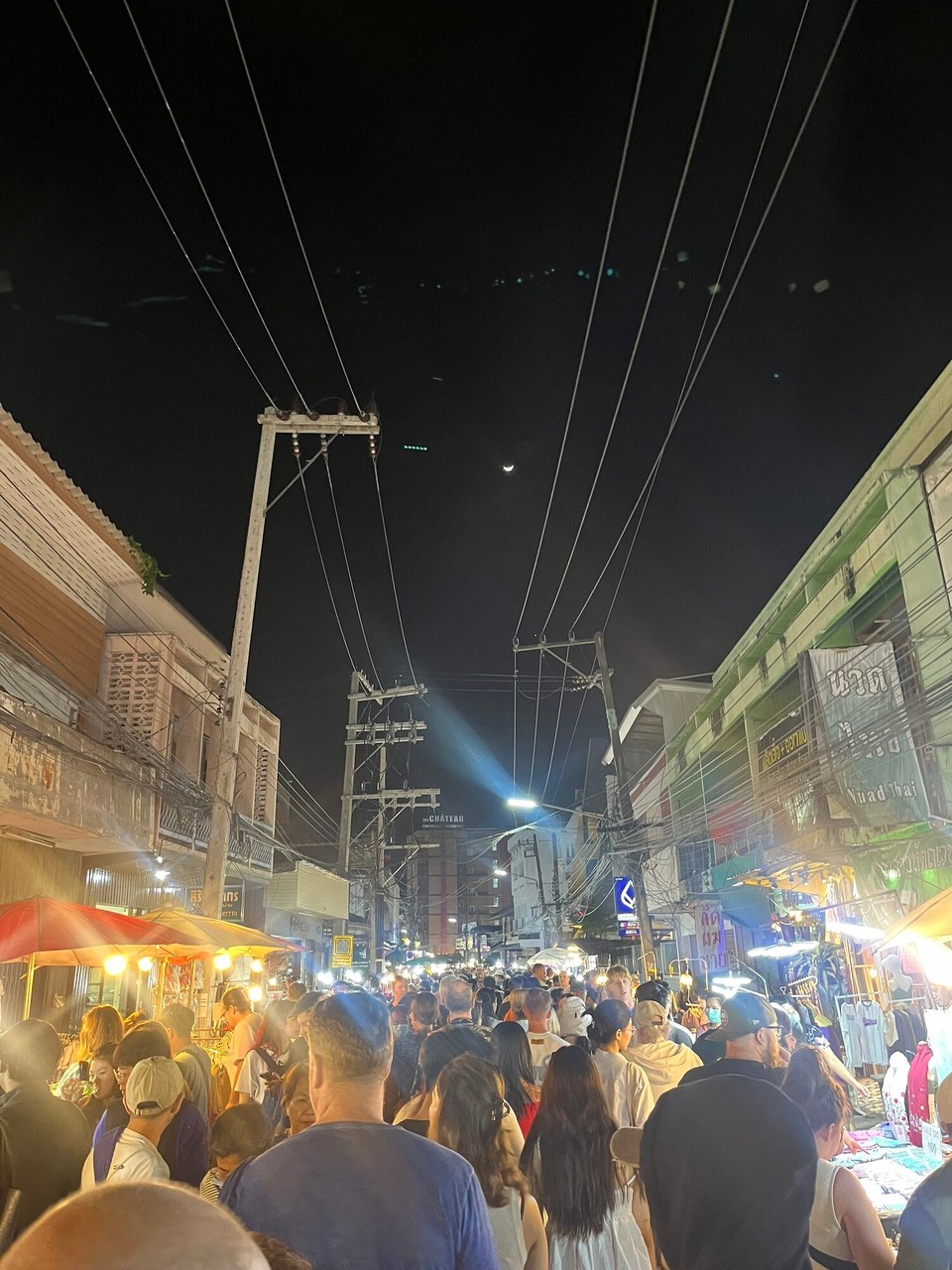 Thailand - Mueang Chiang Mai - After a well earned nap and a FaceTime with mum, I went to the night markets and bought myself some new lighting flash earrings. I had chicken noodles for dinner and met Ellie and Esha. Me and Esha then went out and met Liam who I had met previously in Bangkok. We went out to Lanna Square for drinks