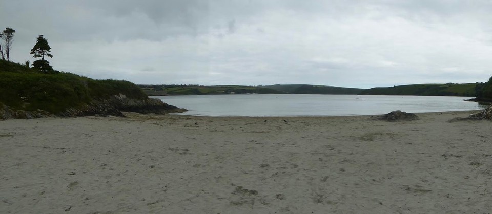 Ireland - Kinsale - One swimmer, and a few people picnicking, but otherwise deserted.