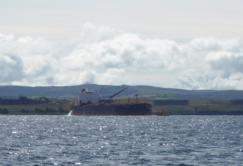 Ireland -  - Red Sun, a crude oil tanker built in 2008 and registered in Liberia, on Zenith Energy’s dedicated single point mooring off Whiddy Island. The oil terminal which has 17 oil storage tanks with a capacity of 1.4 million cubic metres or nine million barrels.