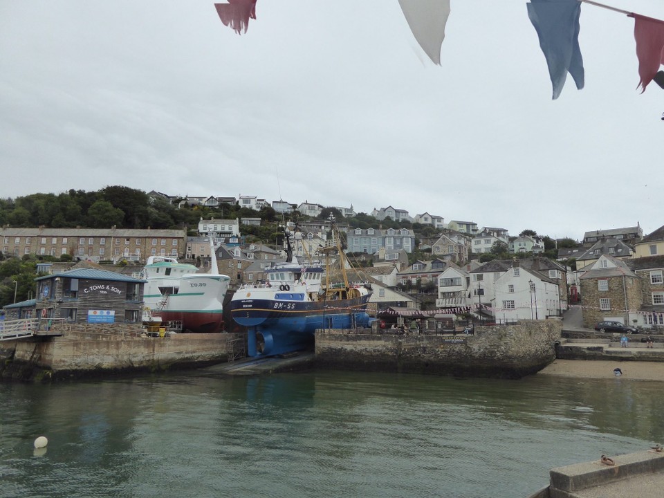 United Kingdom - Fowey - Fishing vessels were being repaired and serviced on the quay, including a sister ship of the very pristine vessel we saw the other day.