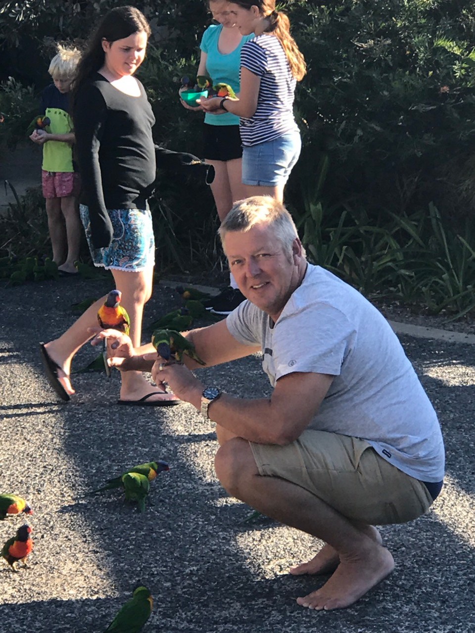 Australia - Merimbula - Steve..Lorikeet bird whisperer ! 
Ros..get the fkn things off my head !!!!