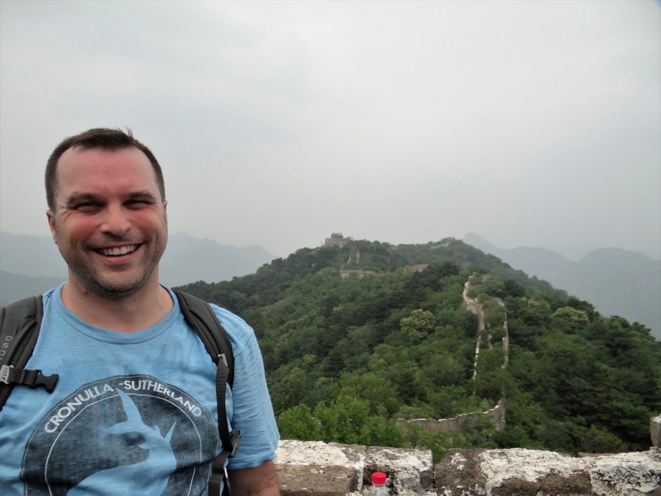 China - Beijing - Luke on the un-restored section of the Great Wall