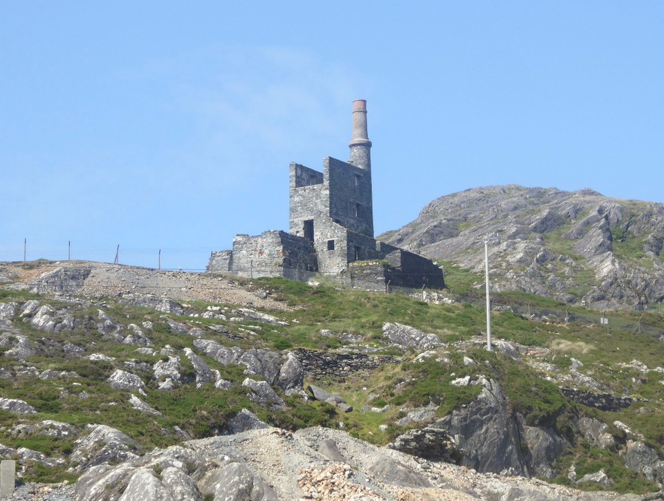 Ireland - Eyeries - The Mountain Mine man engine house installed in 1862. Daphne du Maurier’s novel ‘Hungry Hill’ (the rocky peak seen from Adrigole Bay) is loosely based on the history of the Puxley family.