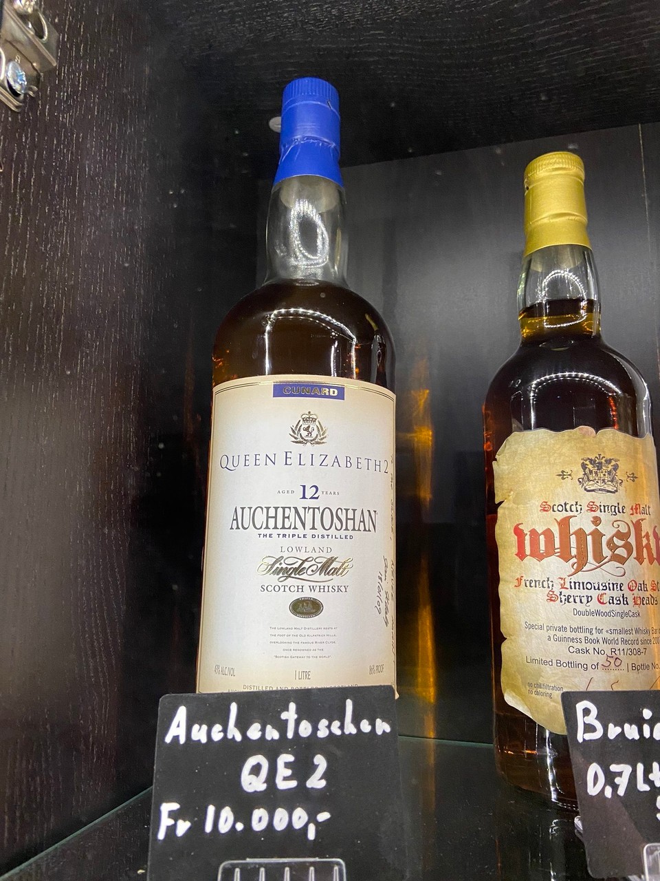 Schweiz - Sta. Maria V. M. - Diese teure Flasche ist 30 Jahre auf der Queen Elizabeth 2 um die Welt gesegelt 