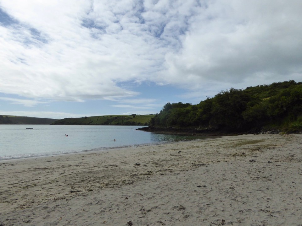 Ireland - Kinsale - Being a Saturday, and a little later, the beach had a few groups going for a morning dip; many were sensibly in wetsuits.