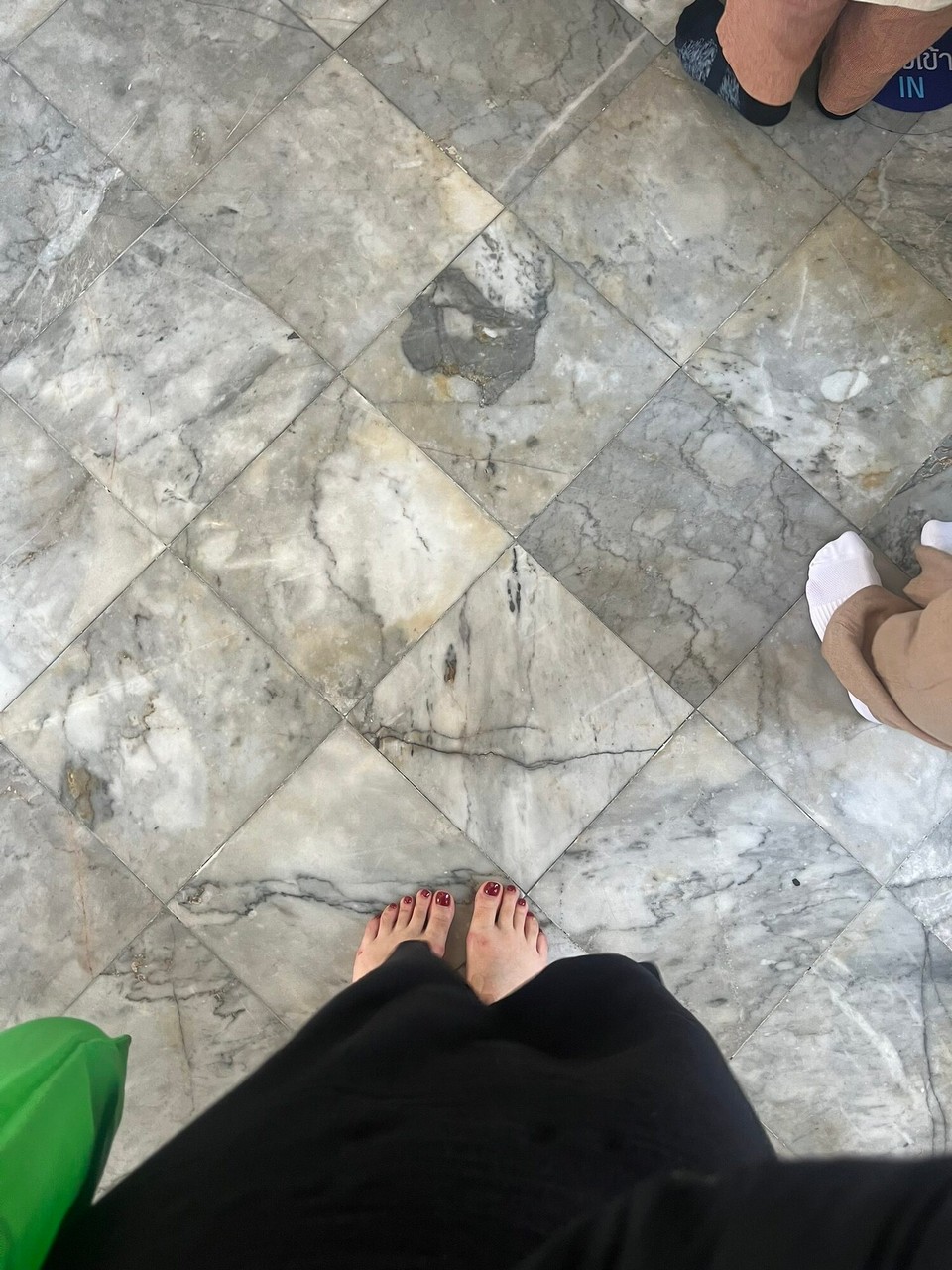 Thailand - Bangkok - We went into the temple to see the golden Buddha and discovered that we loved walking around bare foot 😂. Luckily I had my pedicure the day before! 