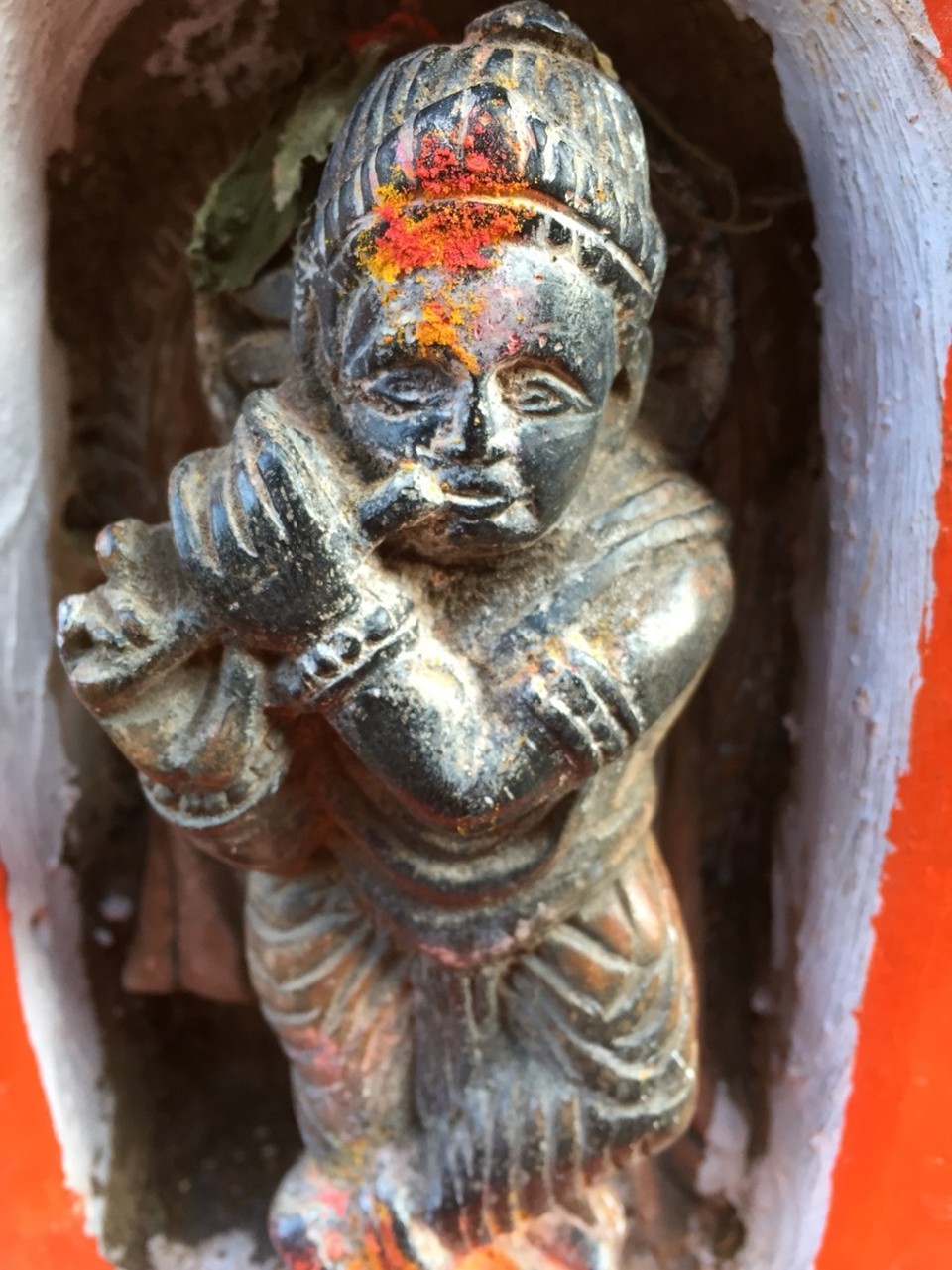 Indien - Gokarna - Krishna Flöte spielend. 
