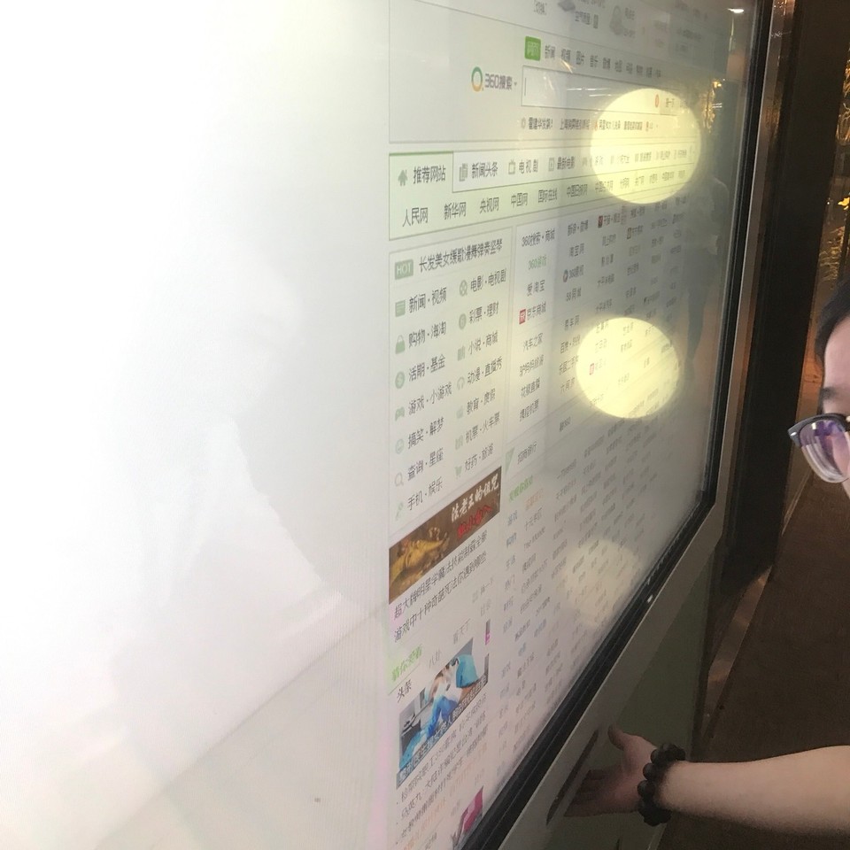 China - Hangzhou - Wow. HighRes Touch Monitor just in/on fully transparent Window