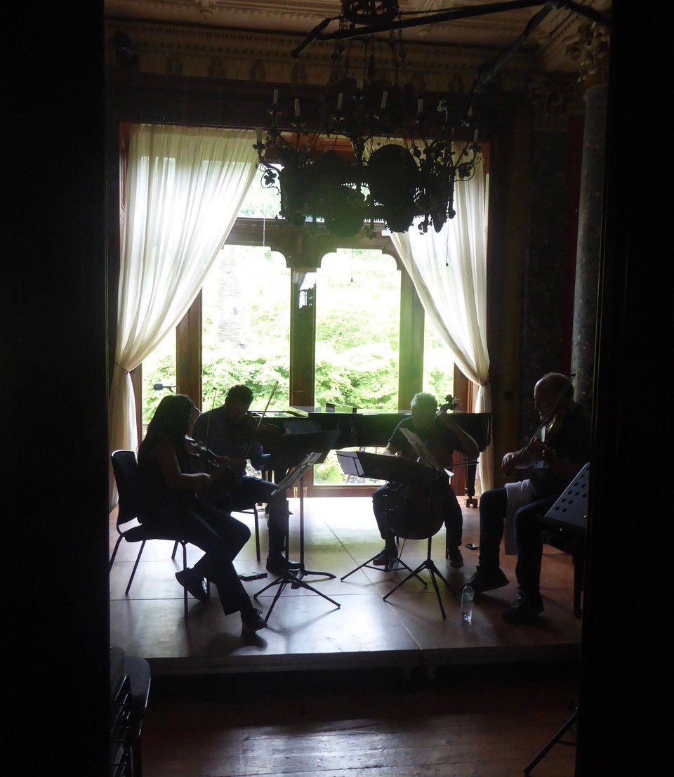 Ireland - Bantry - A quartet rehearsing in the library for a concert this evening.