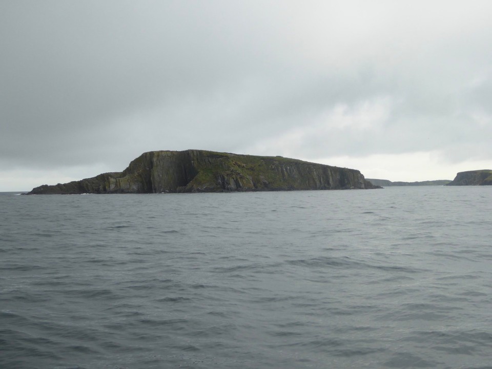 Ireland - Union Hall - Adam Rock. There are two islands in Glandore Harbour, Adam and Eve. The pilot book says to avoid Adam and hug Eve. Coming close to her means you see the green navigation marks which help you avoid a hidden rock in the middle of the harbour.