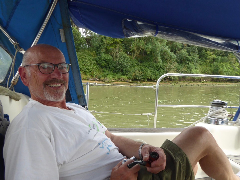 United Kingdom - Woodbridge - A relaxing afternoon reading and watching the tennis - as well as the youngsters on Pioneer trying the row their tender.