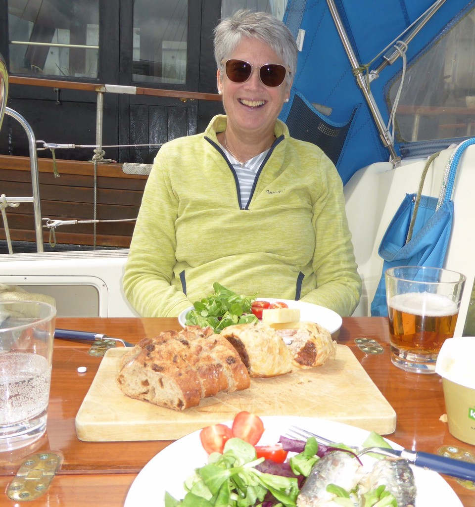 Ireland - Malahide - Kevin checked the engine whilst I searched the yard for a super long hose to reach the nearest tap. We also replaced the fabric on the hatch blinds and bought some provisions. 
When the sun appeared it was warm so we enjoyed lunch on deck.