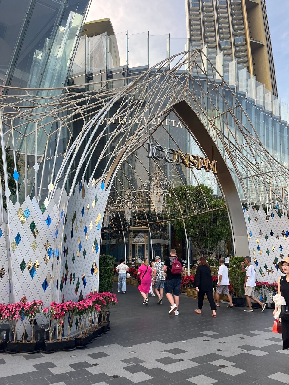 Thailand - Bangkok - ICONSIAM is a shopping centre in Bangkok and was very modern.  The shops were mainly designer but they had a food market which I walked through. They also had a big statue of the girl from squid game