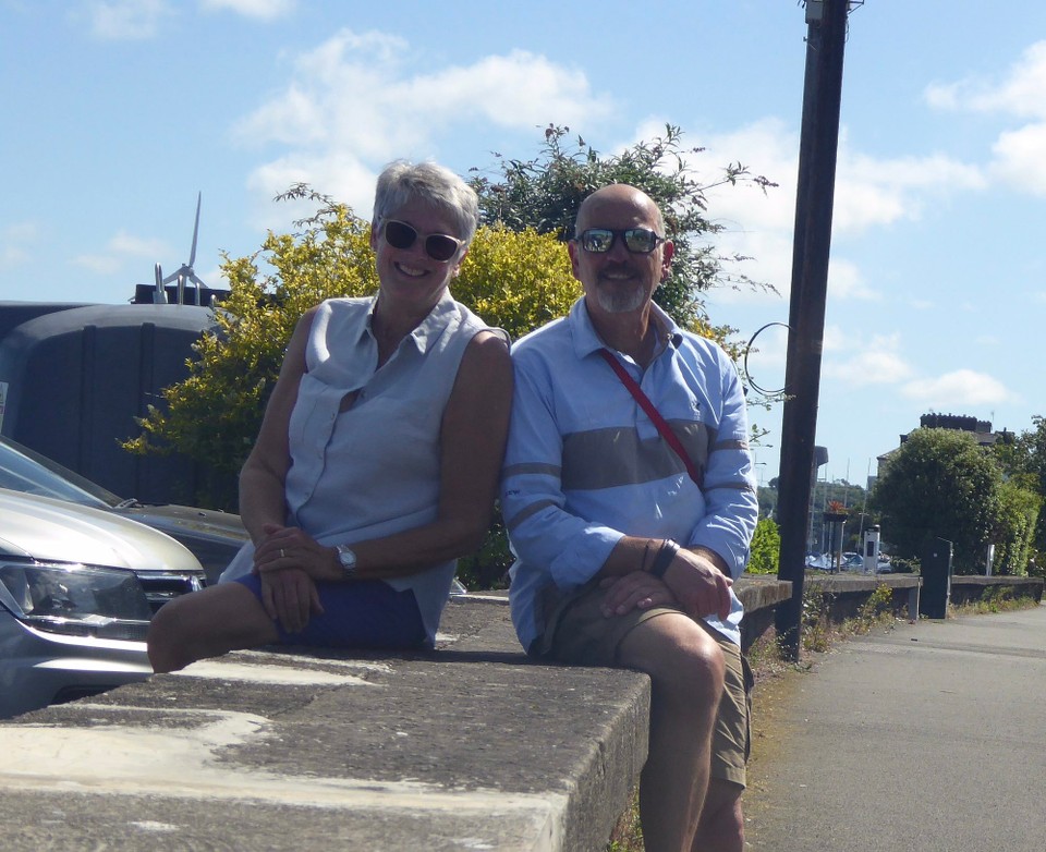 Ireland - Monkstown - Monkstown Railway platform was opened in 1902.  Now disused, it is a rite of passage for children to ‘walk the wall’. No way could I climb up there, so we decided to sit on it!