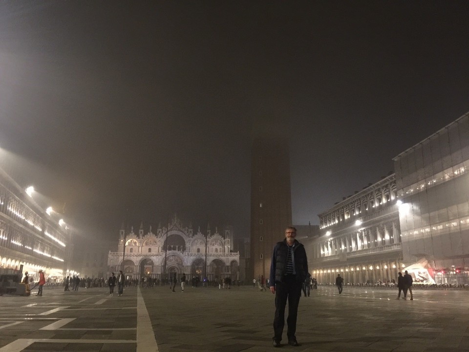 Italy - Venice - St Mark's Square in fog. The Basilica and Campanile di San Marco, the basilica's bell tower. 