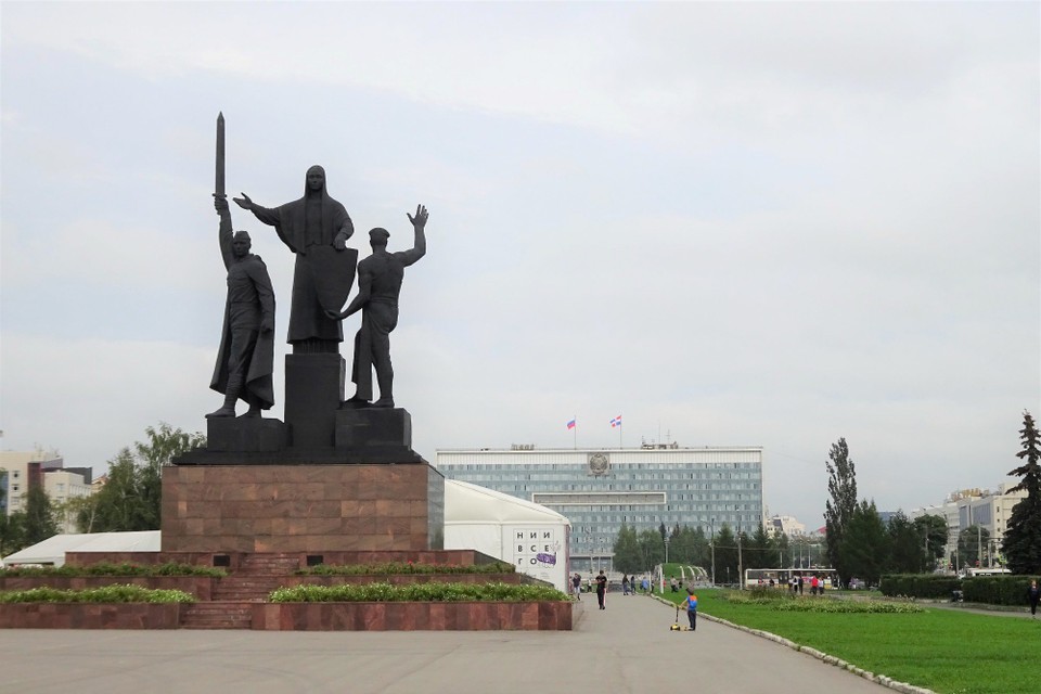 Russia - Perm - A Soviet war monument  and a nice Soviet building behind.