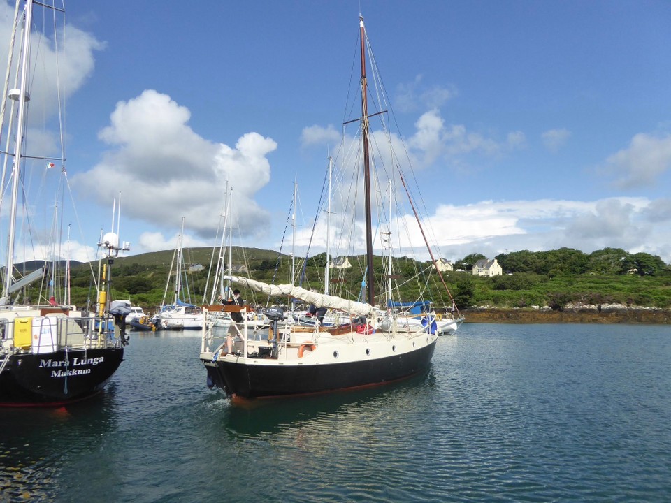 Ireland - Bere Island - Londubh leaving Lawrence Cove. John and Mairead changed plans slightly to go shopping in Castletownbere before heading for the Ilen River.