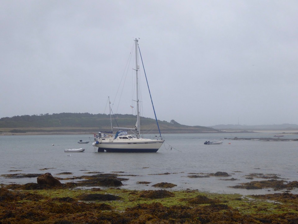 United Kingdom - Isles Of Scilly - And then it rained and rained. A contrast to the beautiful day yesterday. We worked, and Kevin calculated whether the new size Calor gas canister will fit in our gas locker when we change our current one (the 4.5kg butane cylinder has been replaced by a 7kg one).