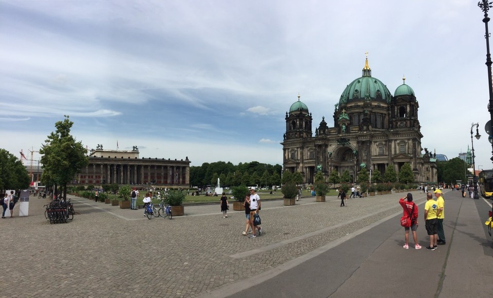 Germany - Berlin - A panorama of the Lustgarten. The Lustgarten is bounded also by the Kupfergraben, a canal off the Spree and the slowly being rebuilt Berlin City Palace (German: Berliner Stadtschloss). A royal and imperial palace in the centre of Berlin, the historical capital of Prussia, and subsequently Germany. It was the winter residence of the Kings of Prussia and the German Emperors. In 2013 work started on reconstruction and a part of the exterior of the palace has been rebuilt. The completion is expected in 2019. 