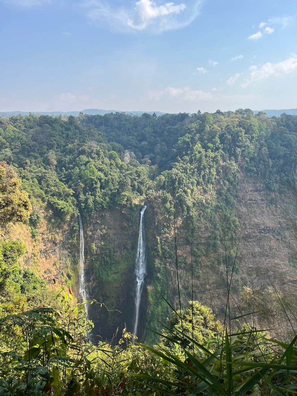Laos - Pakse - The Tad Fane waterfall was so beautiful. The pictures don’t do it justice but it so huge and falls so far down. To pump some andrealine we all decided to do the zip lines across the waterfalls. It was amazing, I was buzzing when we completed it. Had to do it in flip flops, the tightrope was hard 😂
