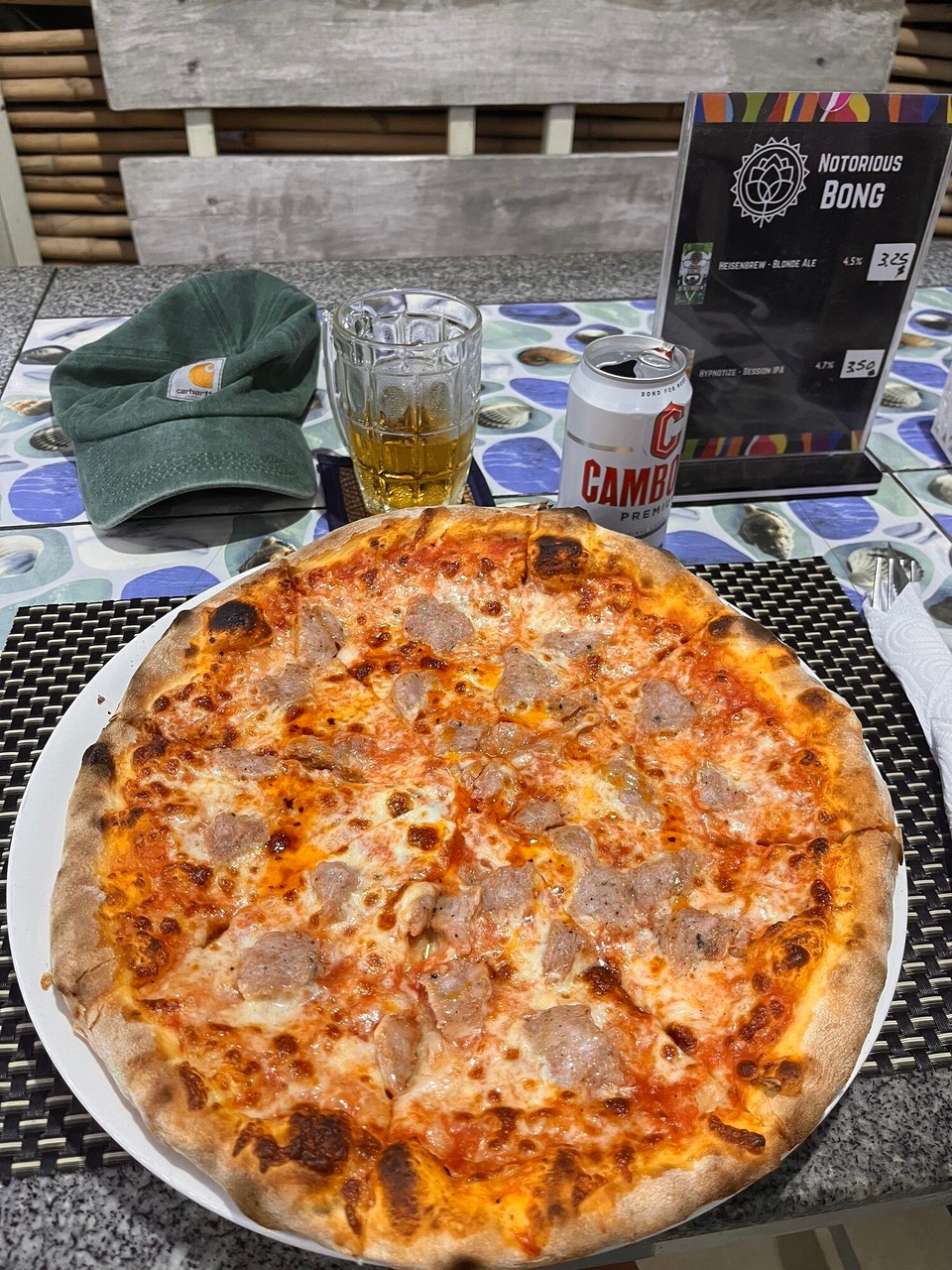 Cambodia - Kampot - Was starving afterwards and was craving something western so I went to an Italian and got this huge sausage pizza. Best believe I ate the whole thing and then had an ice cream too! Went to bed at around 10ish again and up early again tomorrow for my ferry to Koh Rong 