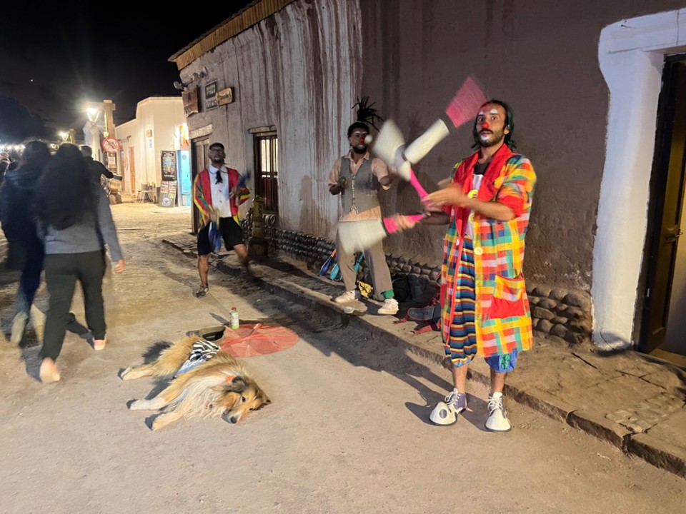 Chile - Atacama Desert - Street performers ( love the collie in front!)