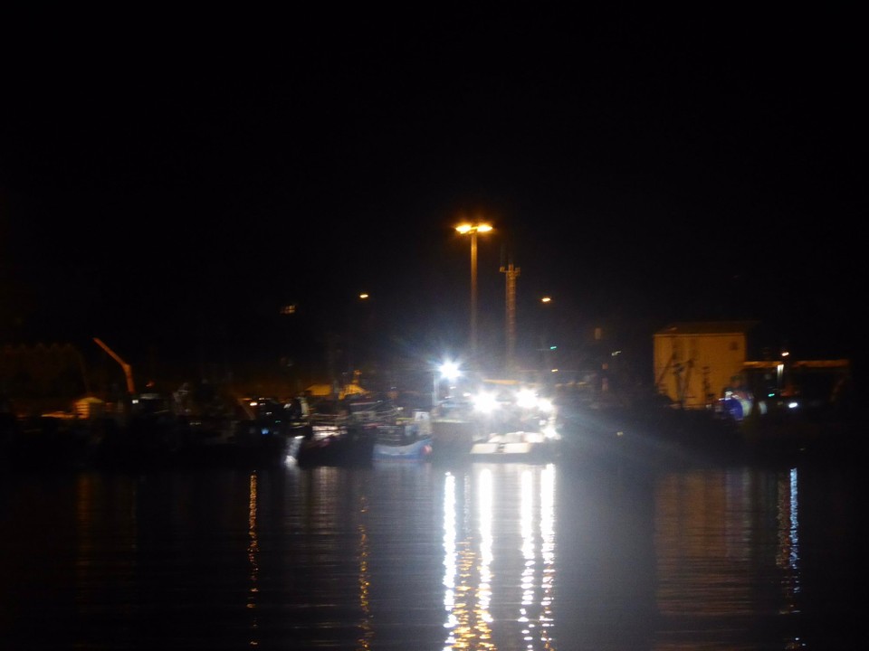 Ireland - Union Hall - We’re anchored across the bay from the fish harbour. The bright lights are the only indication in the middle of the night.