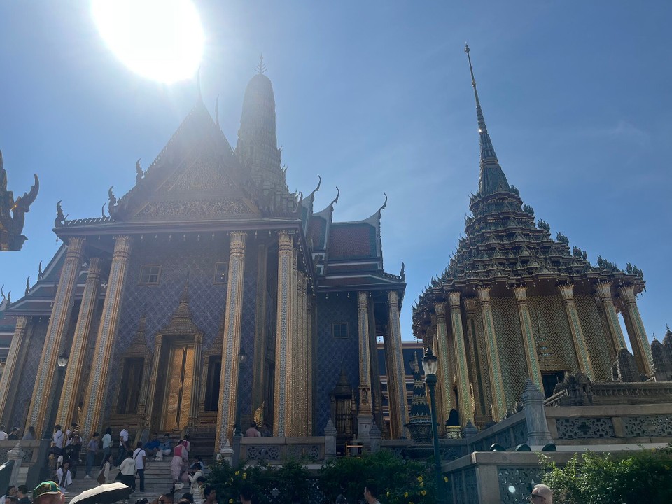 Thailand - Bangkok - Took myself off to see the Grand Palace, it was so beautiful and full of gold and sparkles! I asked a man to take a picture of me and he only got my head in (I guess the main event is the temple in the background😂). Super busy here & lots of tourists from Japan 