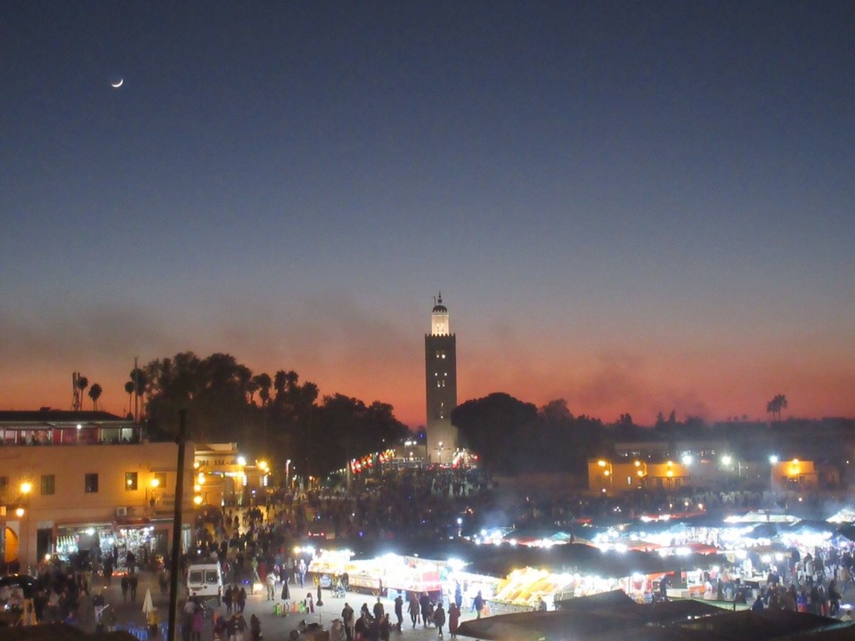Morocco - Marrakech - Watching the craziness of the Djemma El Fna unfold from a safe distance! Later we would go into the heart of it! Wow!