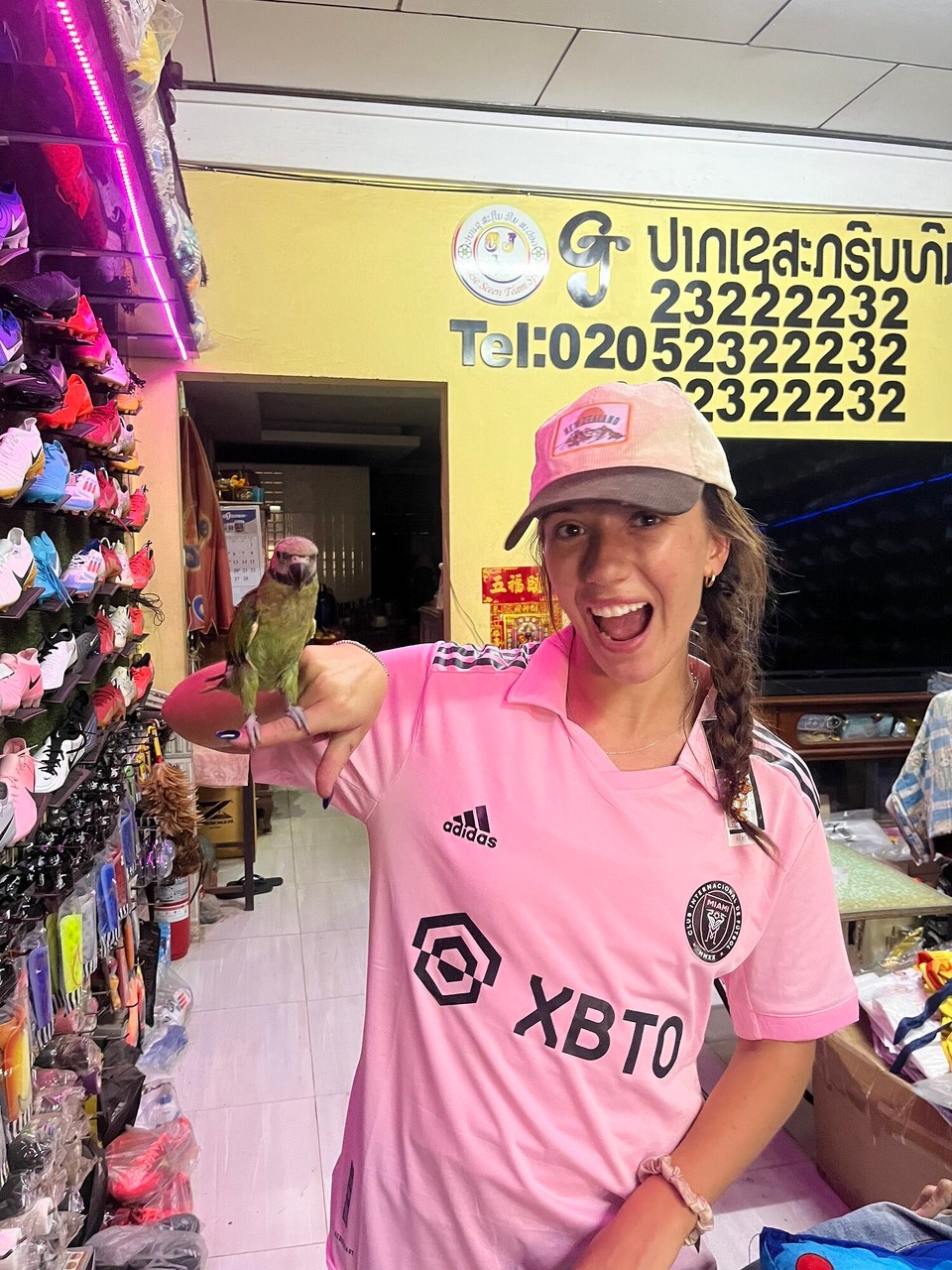 Laos - Pakse - This bird lives in the jersey shop 😂