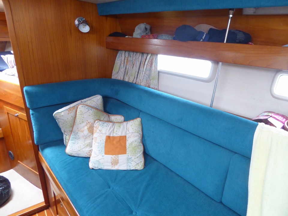 Ireland - Bere Island - In the saloon, there is a bench seat / bunk on one side.