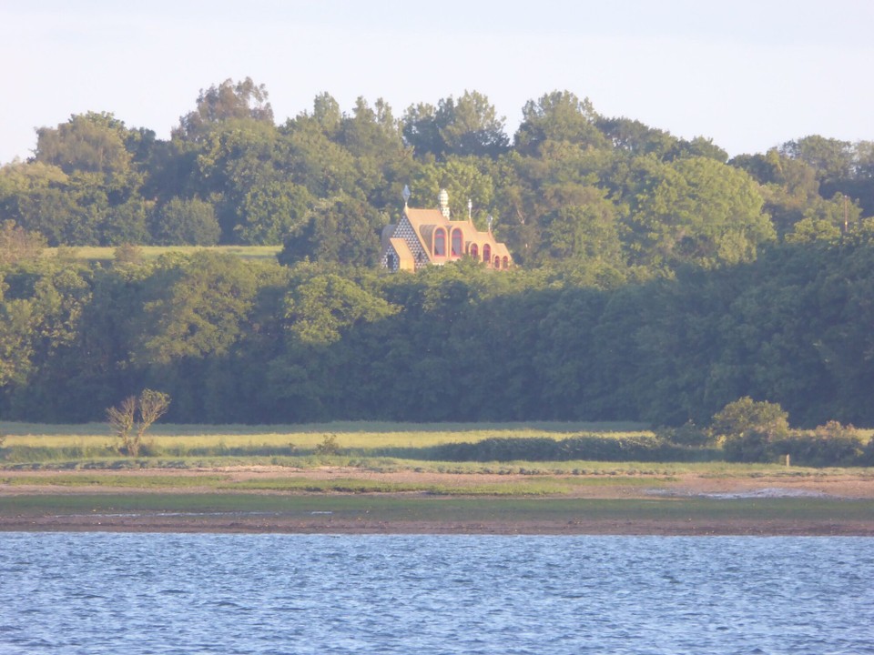 United Kingdom - Ipswich - Grayson Perry’s house in Wrabness glinting in the evening sunshine.