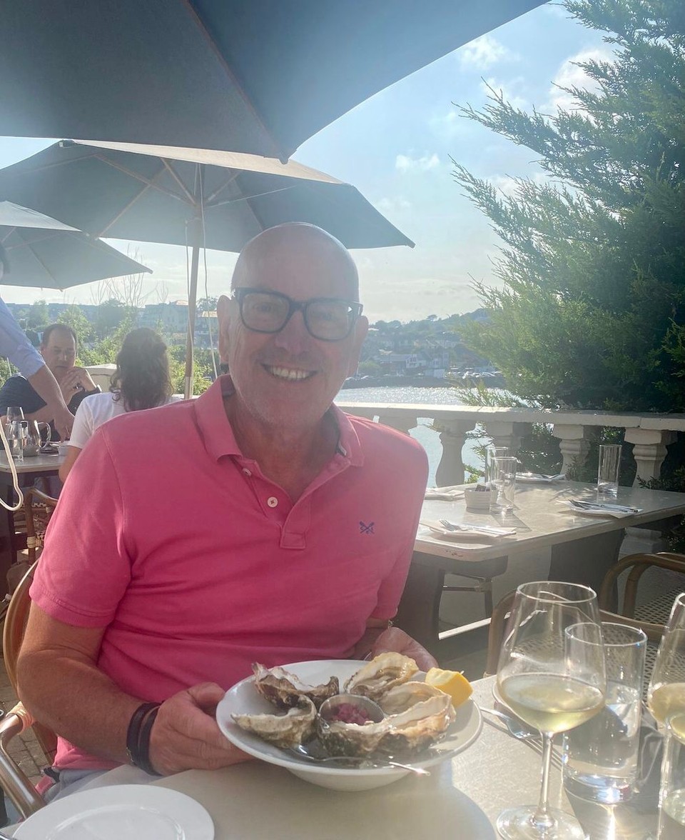 Ireland - Kinsale - Kevin enjoying oysters at Man Friday. Producing the delicious food is chef Daniel Horgan who trained at Ballymaloe Cookery School in Shanagarry, a famous cookery course run by celebrity chef Darina Allen.  Last autumn, coming to check on Avalon, we stayed in the nearby Ballymaloe House Hotel. 