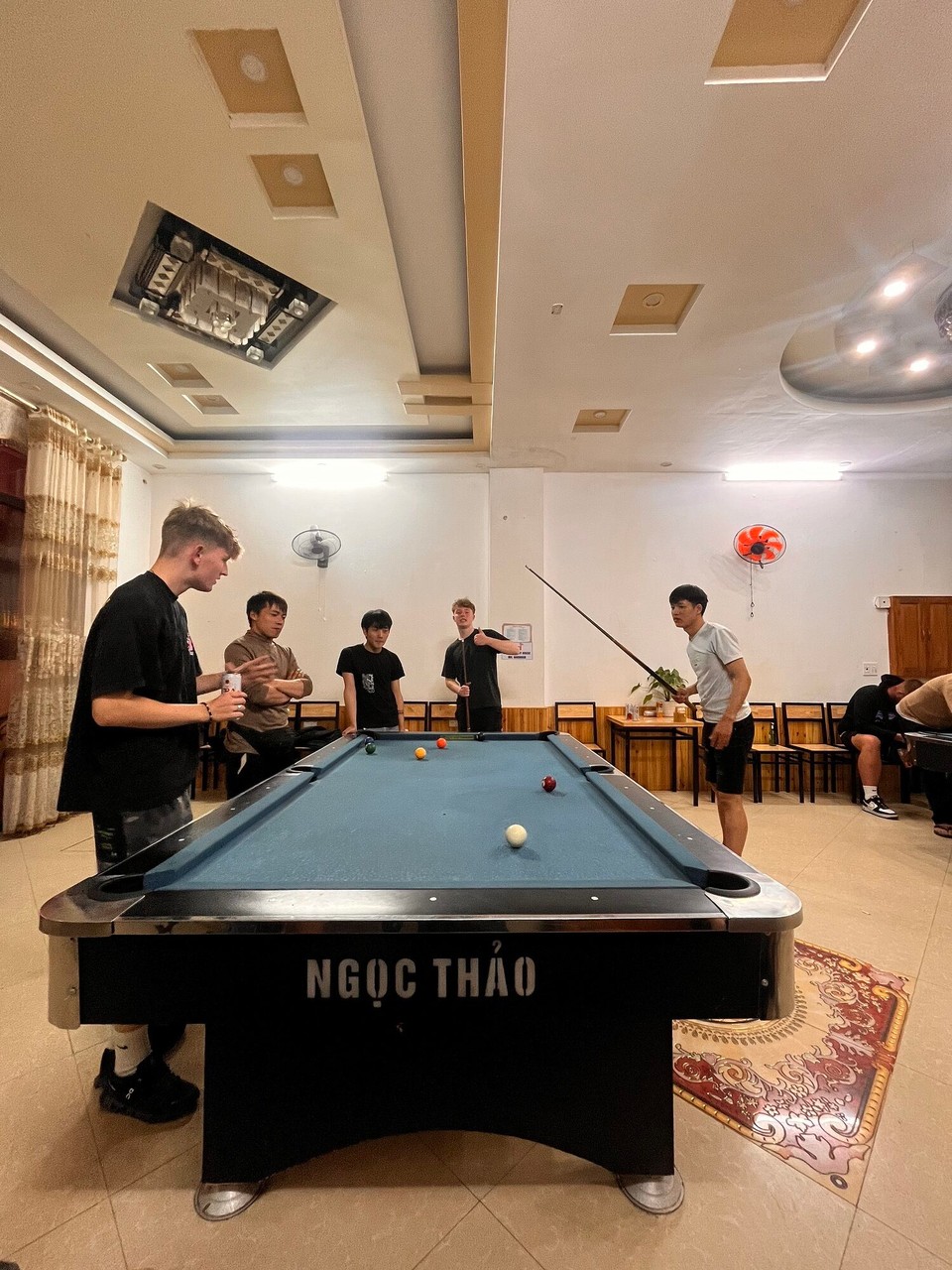 Vietnam - Ha Giang - The boys and the riders played a view games of pool and then there was a disco on. Had a little dance but our curfew is at 11pm everywhere we stay so some boys from a different group hosted a dorm party 