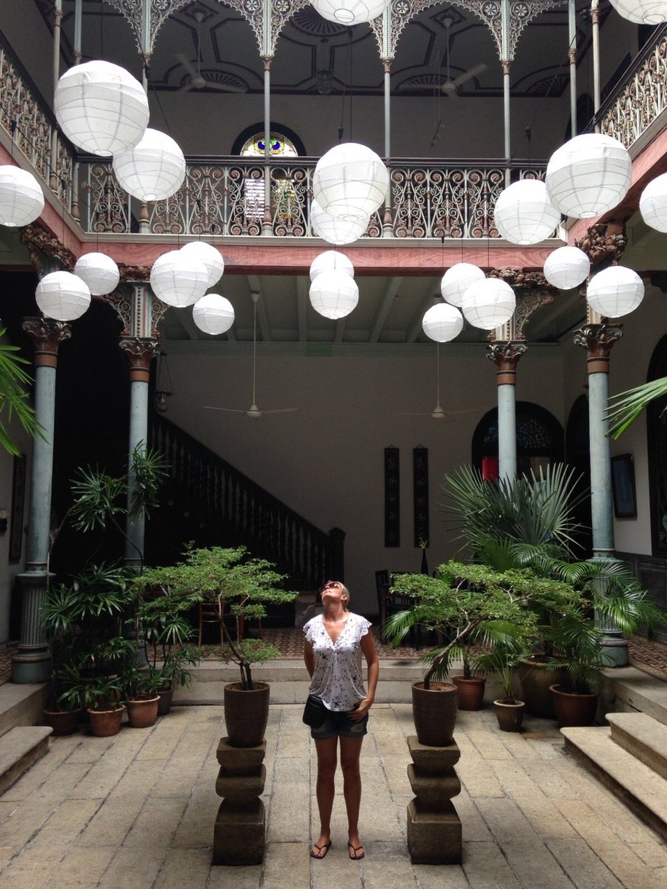 Malaysia - Georgetown - Getting my free chi and admiring the view in the open air courtyard.  According to Pat, our guide, this is the central point in the Mansion for chi!