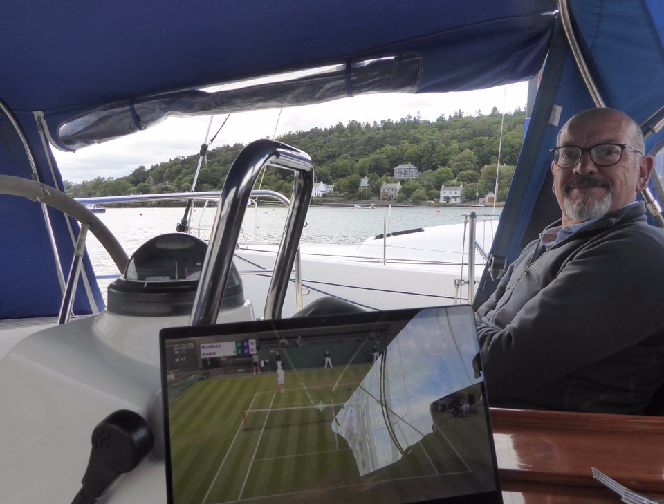 Ireland - Crosshaven - A perfect evening for Kevin to enjoy the view, and for me to watch the tennis.