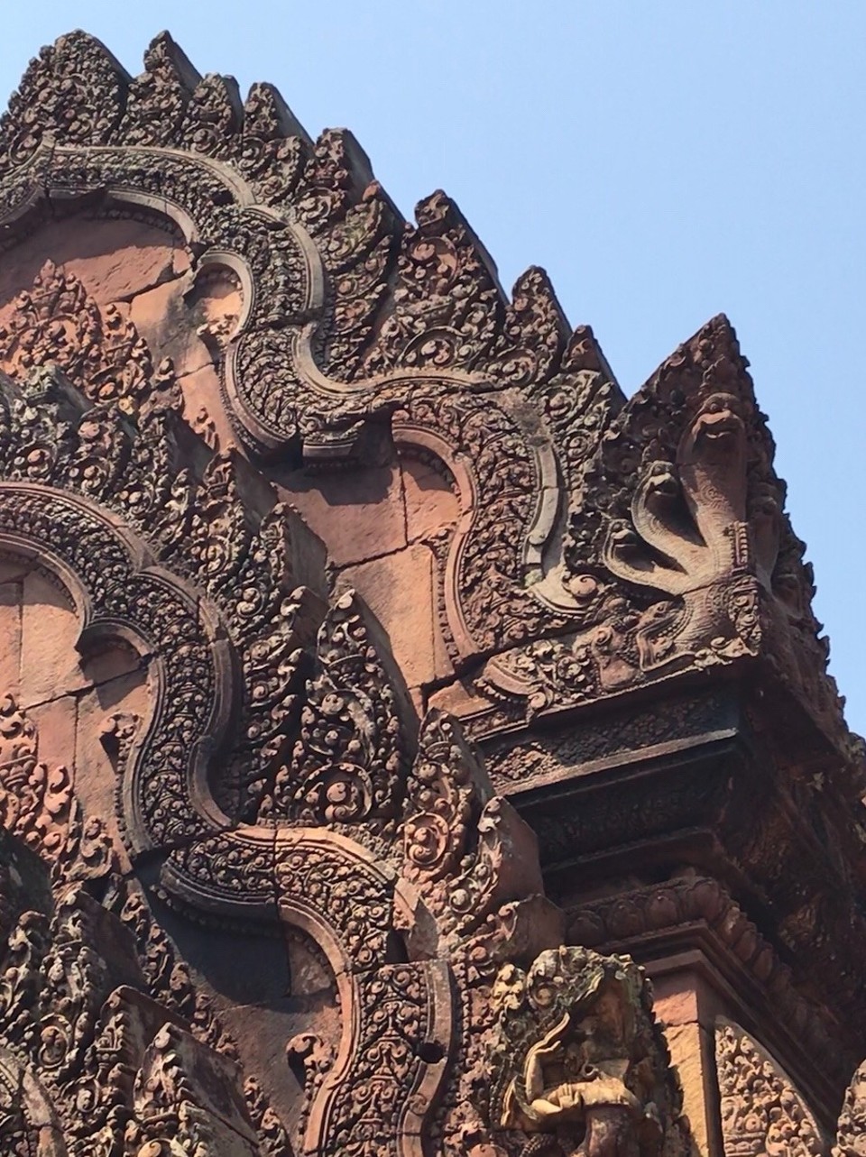 Cambodia -  - Beautiful carvings of the three nagas at Banteay Srei