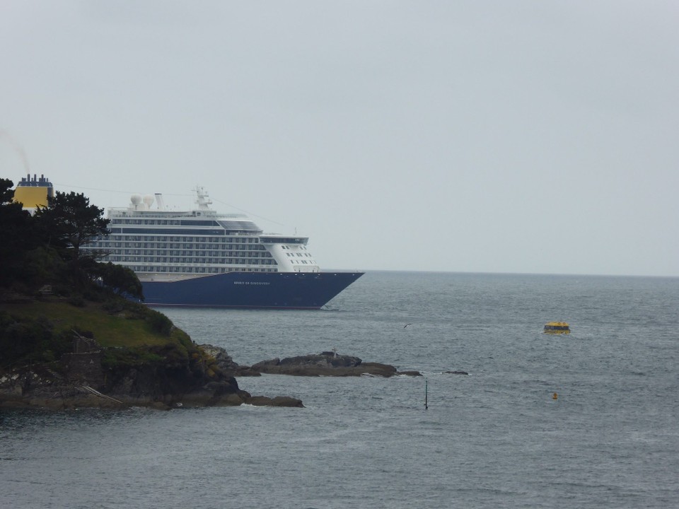 United Kingdom - Fowey - The Princess of Discovery; her construction and delivery were delayed because of the Covid-19 pandemic, but she is the sixth and final Royal-class cruise ship in the Princess fleet. The weather had turned windy and mizzly,and we wondered about the trip in the tender - it didn’t look comfortable! 