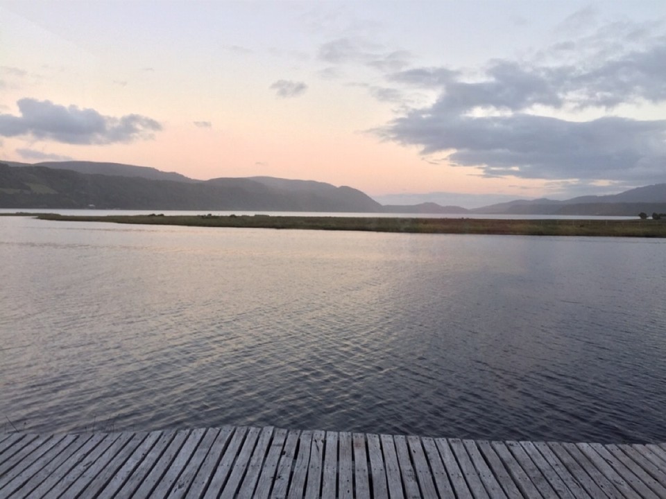 Chile - Chiloé - evening lights over lake cucao