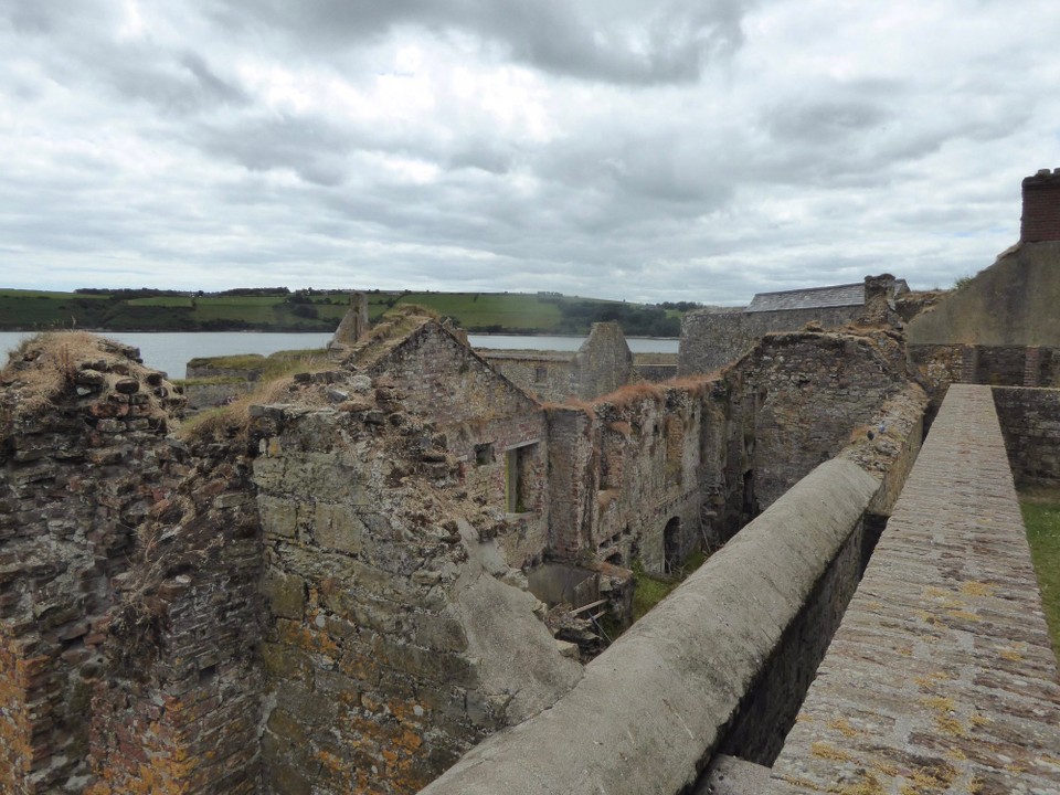 Ireland - Kinsale - Charles’ Fort was a ‘second generation’ bastion fort built in 1682. The outer wall was built in a star fashion, and in between that and a thinner inner wall, there is a wide earth section to take the impact of cannonballs. The buildings were built away from the wall to prevent damp.