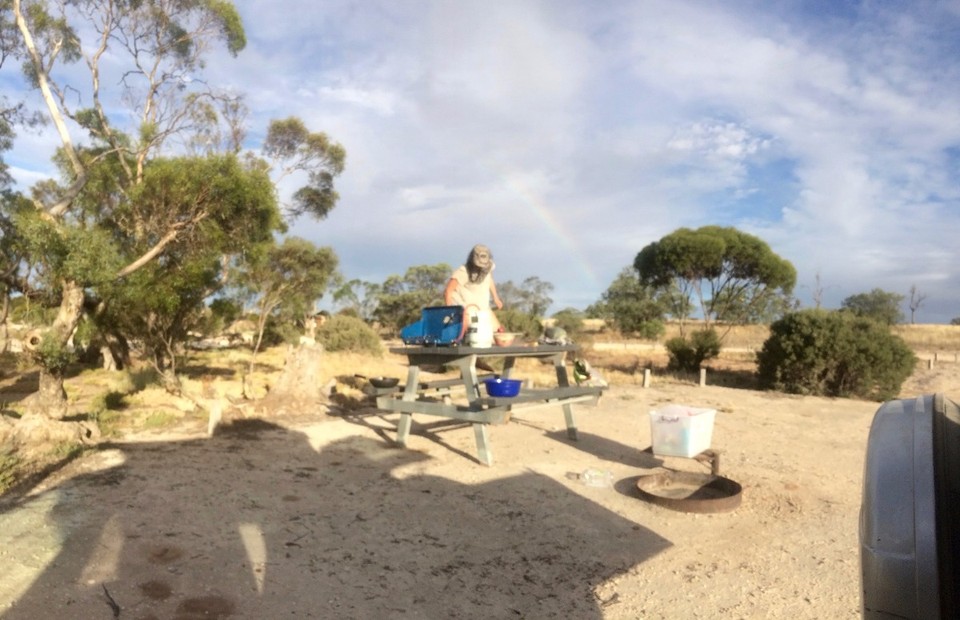 Australia - Murray-Sunset - Chrissi preparing dinner from on the table. The has a thing with ants... and there were quite a few.