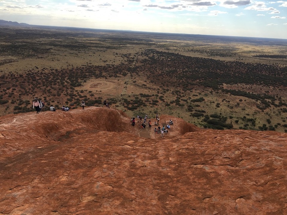 Australia - Yulara - Koby and Daniel overlooking the Bus load of tourists that made it to the top of the chain.