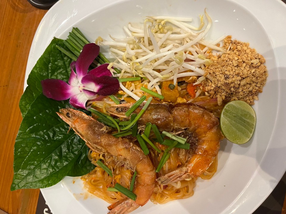 Thailand - Mueang Chiang Mai - This was shrimp pad Thai, I also had spring rolls. For a fancy restaurant, I was shocked that my total bill only came to £8.49!!! Early bed for me tonight, the hostel are going to a Muay Thai fight but I said no bcos I really need a rest day! Am writing from my hostel bed before I sign off for today