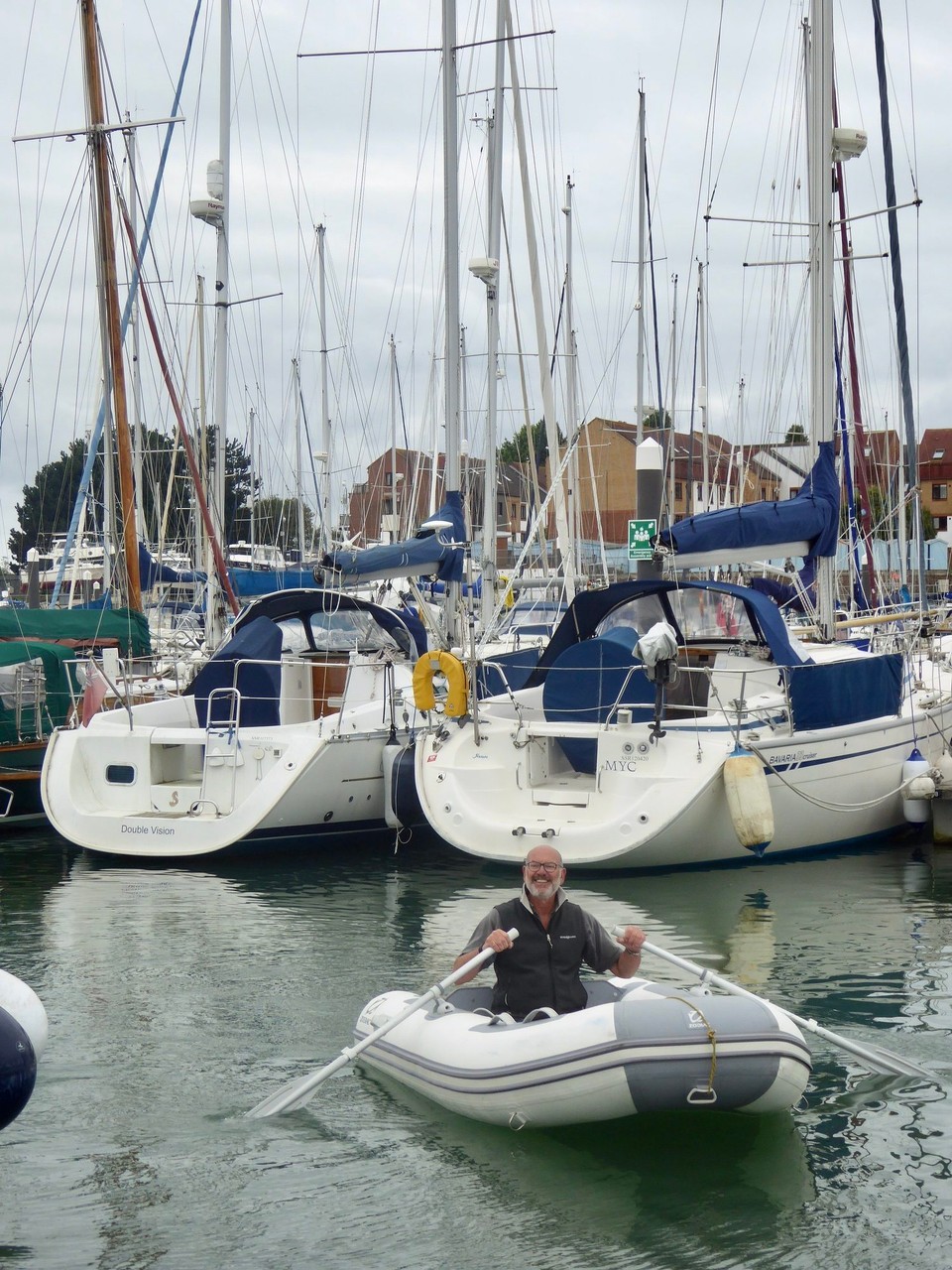 United Kingdom - Southsea - The marina is very tight; panicking last minute, I handed the helm to Kevin who berthed Avalon superbly. Fortunately someone took our lines, too, so I avoided jumping onto a narrow, wobbly pontoon. Planning not to anchor or pick up a mooring buoy again this year, we packed and stowed the dinghy.