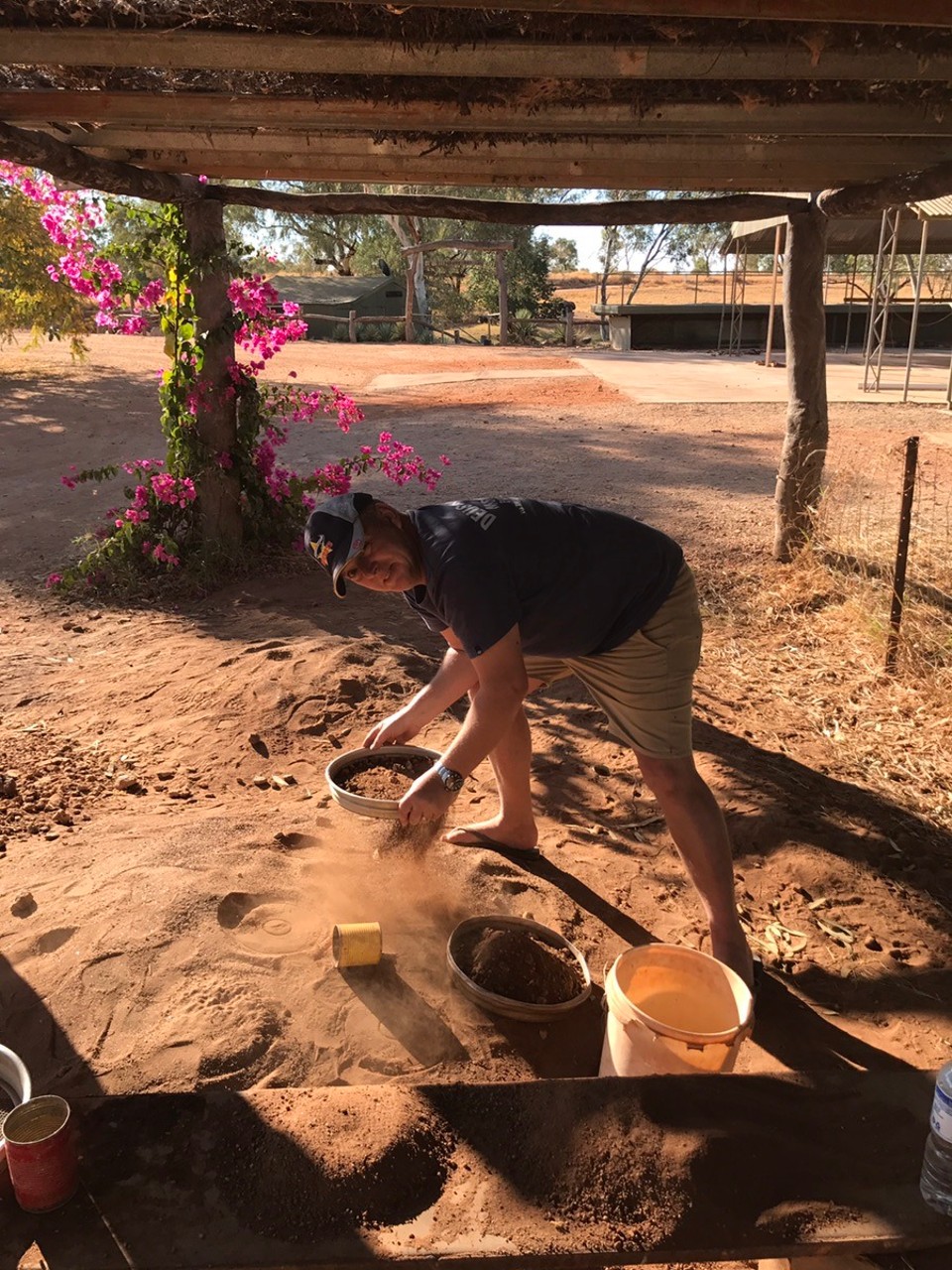 Australia - Plenty Highway - Scooping our bucket into the sieve